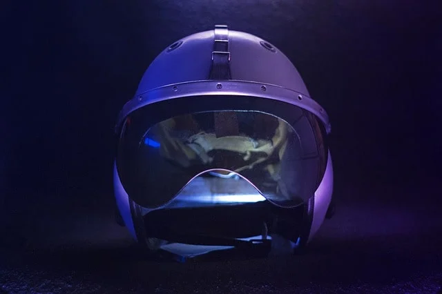 Happy motorcycle rider wearing protective gear