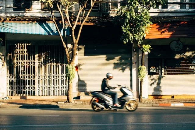 Motorcycle rider staying alert and avoiding distractions